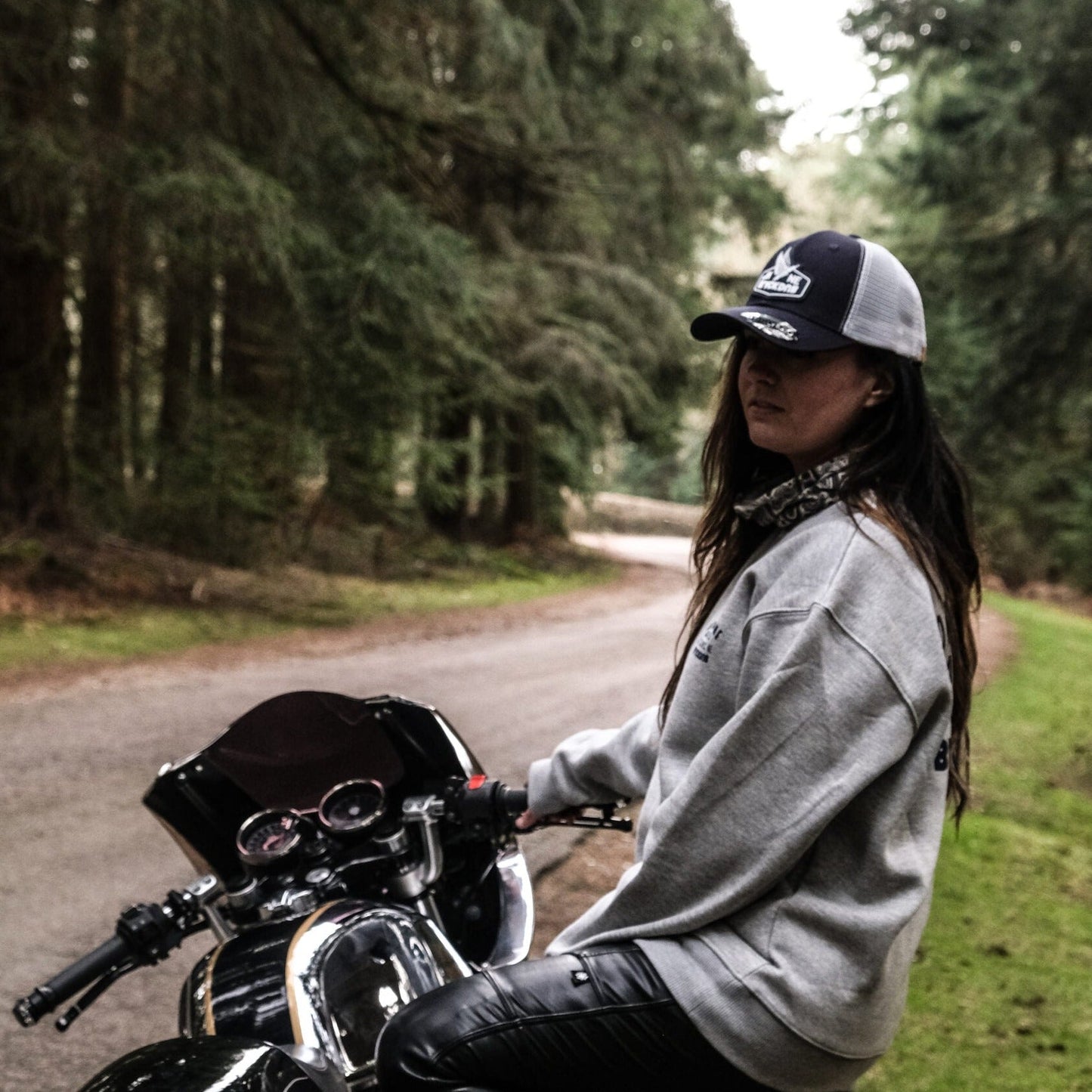 a Uggly&Co flat track cap with Wreckitwren and the royal enfield in the new forest